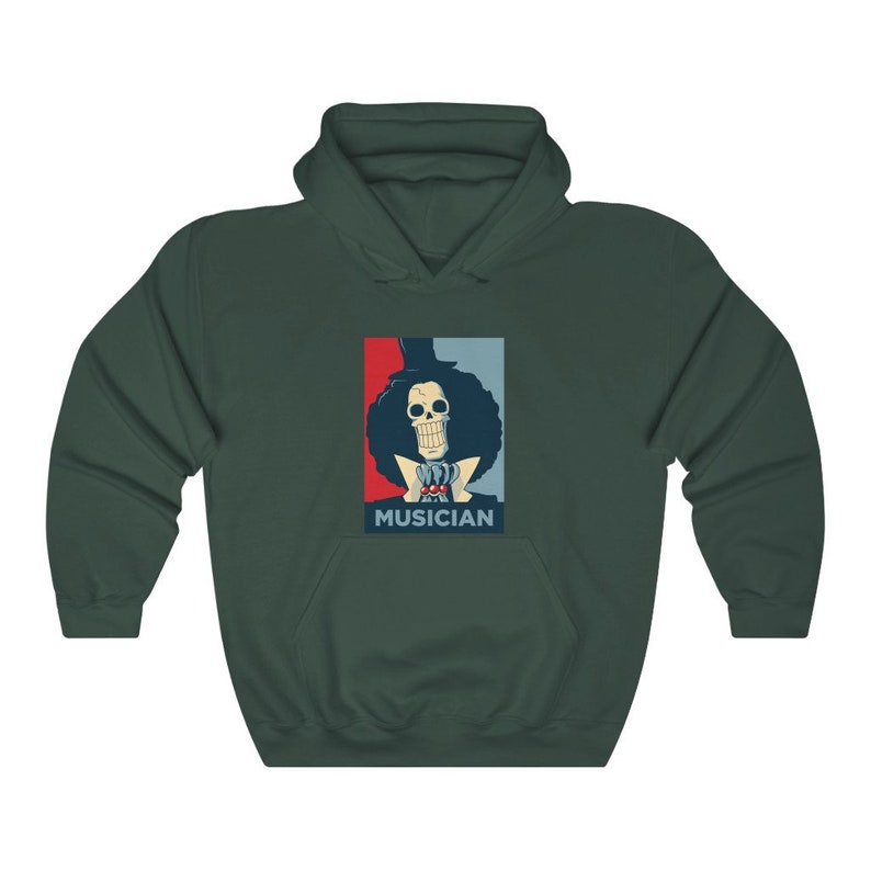 May include: A dark green hoodie with a graphic of a skeleton character with a top hat and the word "MUSICIAN" printed below. The graphic is in a red, white, and blue color scheme.
