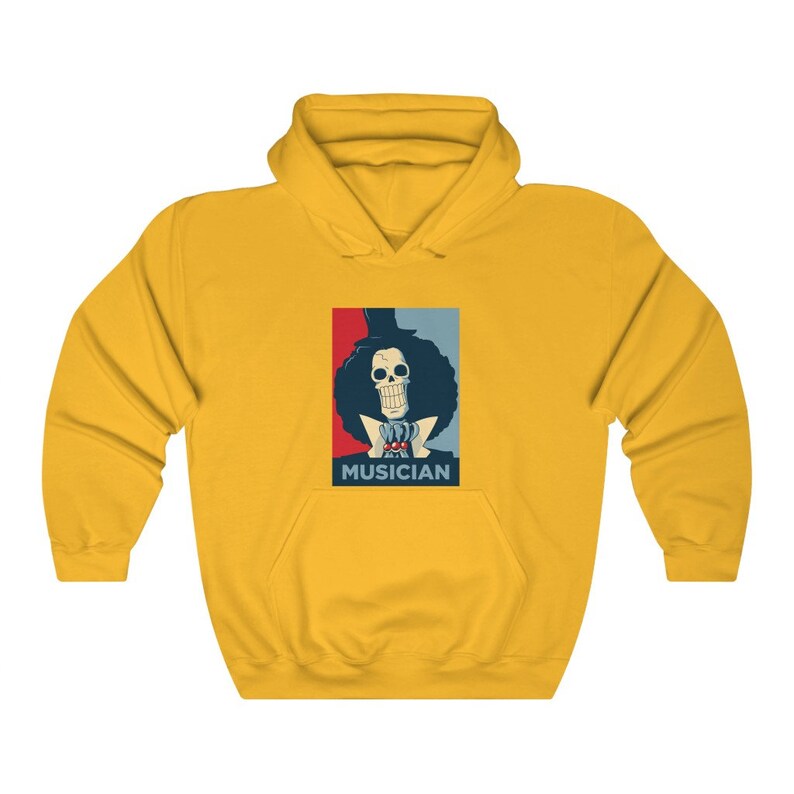 May include: Yellow hoodie with a graphic of a skeleton character with a top hat and the word "MUSICIAN" printed below.