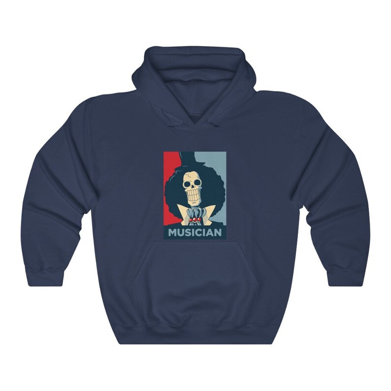 May include: A navy blue hoodie with a graphic of a skeleton character with a top hat and afro, wearing a red bow tie and a blue jacket. The graphic is in a red, white, and blue color scheme and has the word "MUSICIAN" printed below it.