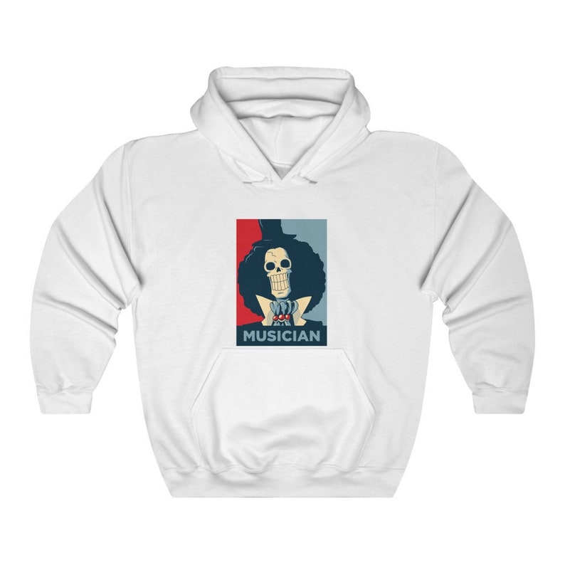 May include: White hoodie with a graphic of a skeleton character with a top hat and the word "MUSICIAN" printed below. The graphic is in a red, white, and blue color scheme.