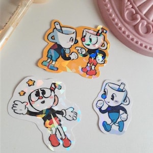 Cuphead Brothers Holographischer Aufkleber - Cuphead - Cute - Drei