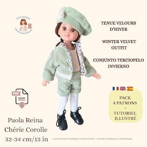 May include: A doll wearing a green corduroy outfit, including a jacket, shorts, and beret. The outfit is trimmed with white lace and paired with black shoes. Text on the image reads "Winter Velvet Outfit" and "Paola Reina Chérie Corolle 13 in".