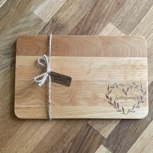 Breakfast board with individual engraving made of wood