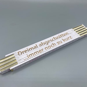 Folding rule personalized with engraving made of wood