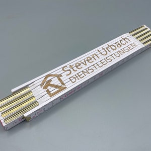 Folding rule personalized with engraving made of wood