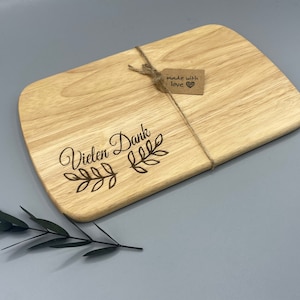 Personalized breakfast board with individual engraving made of rubber tree