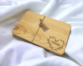 Breakfast board with individual engraving made of wood