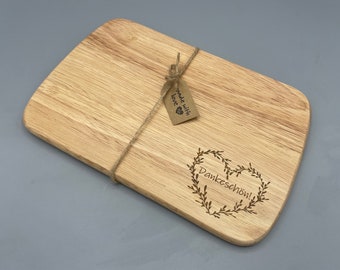 Breakfast board with individual engraving made of wood