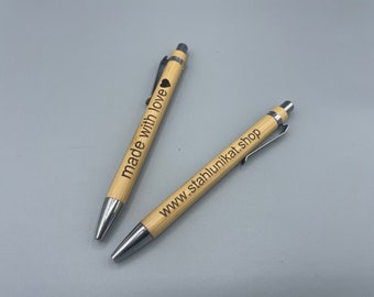 Ballpoint pen with individual engraving made of wood
