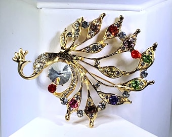 Broche paon vintage dorée avec strass bleu vert - France