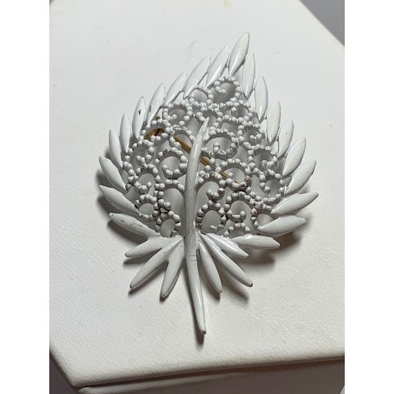 MONET Vintage White Open Metal Work Leaf Brooch - image 1