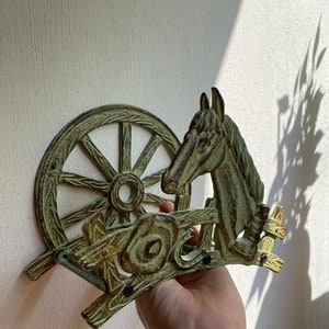 Vintage hose holder horse cast iron colored L.25 x 19 cm