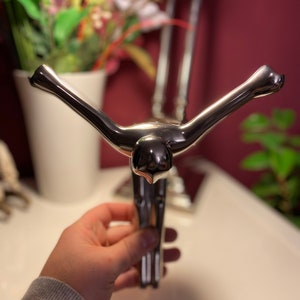 Vintage designer wall coat rack coat hook polished as stylized human