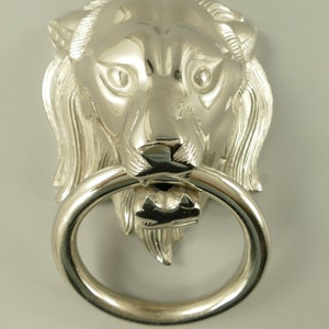 Vintage aluminum lion head door knocker towel rack