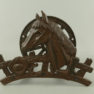 Vintage hose holder horse cast iron rust. brown L.25 cm