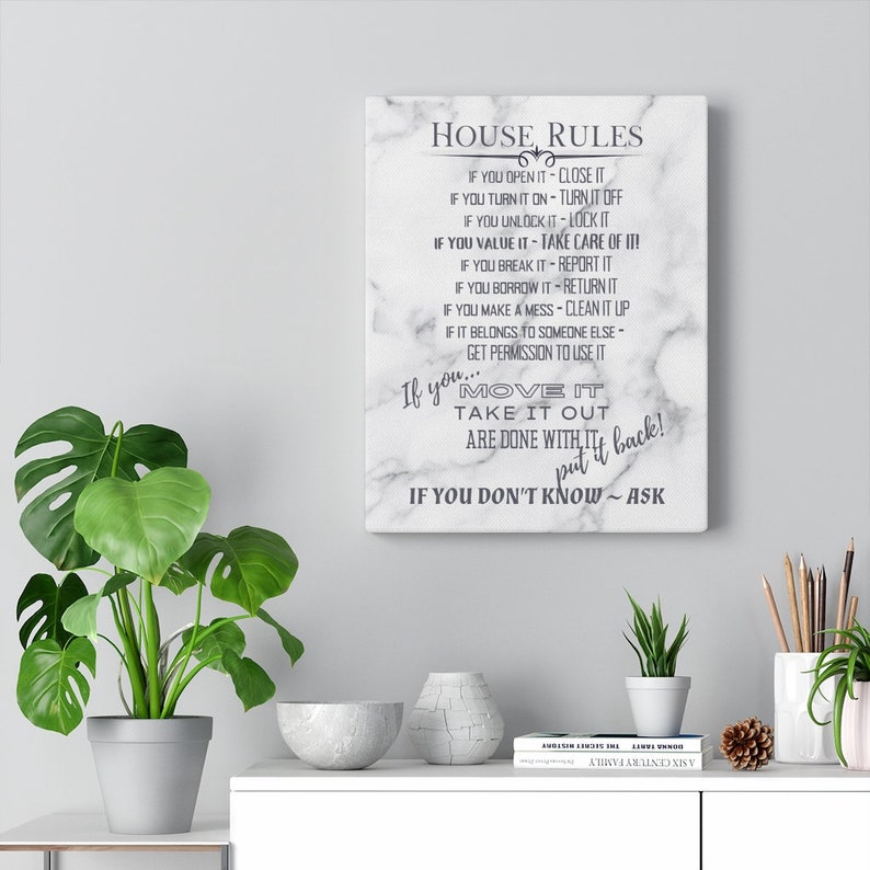 May include: A white canvas print with a marble background and black text that reads "House Rules". The text lists rules for using items in a home, such as "If you open it, close it" and "If you move it, take it out, put it back!"