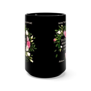 May include: Black coffee mug with a floral design and the text "Mom, you allow me to tell you how amazing I admire you. Love, Aubrey"