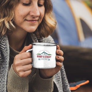 May include: White enamel camping mug with a black and red logo that says "Bobby & Stacey" with a mountain range graphic and the text "Since 1988".