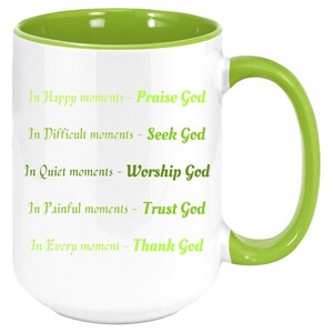 May include: White ceramic mug with a green interior and handle. The mug features the text "In Happy moments - Praise God, In Difficult moments - Seek God, In Quiet moments - Worship God, In Painful moments - Trust God, In Every moment - Thank God."