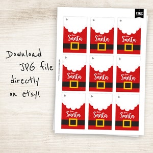 May include: Sheet of Santa gift tags. Each tag features a red Santa suit design with a black belt and gold buckle. The words "From Santa" are printed in white. The text "Download JPG file directly on etsy!" is also visible.