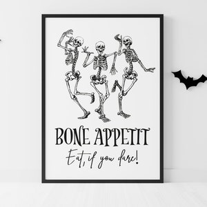 May include: Black and white printable Halloween sign featuring three skeletons dancing with the text "Bone Appetit Eat, if you dare!"