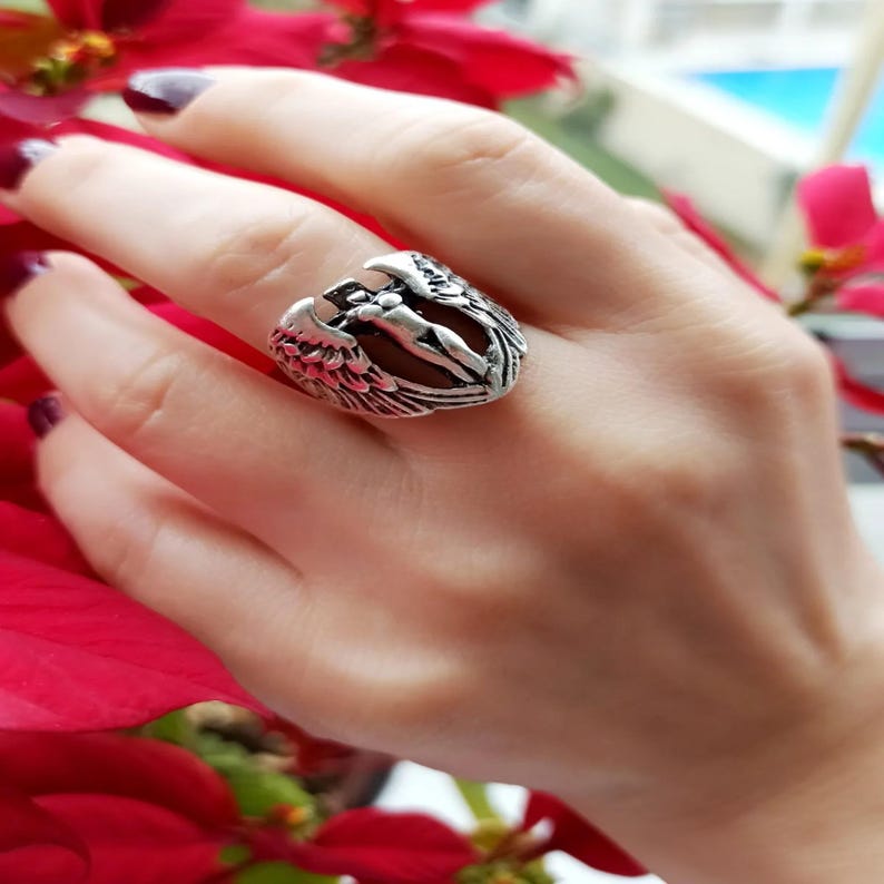 Fantasy angel woman ring styled for gothic and mythology lovers.