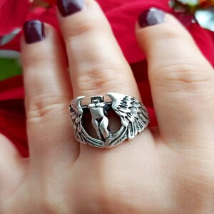 Detailed view of handcrafted Valkyrie-style silver ring with bold gothic design.