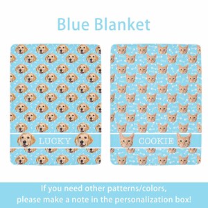 May include: Two blue blankets with pet-themed designs. One features golden retriever faces and the name "LUCKY", the other has orange cat faces and the name "COOKIE". Both have a light blue background with bone or fishbone patterns.