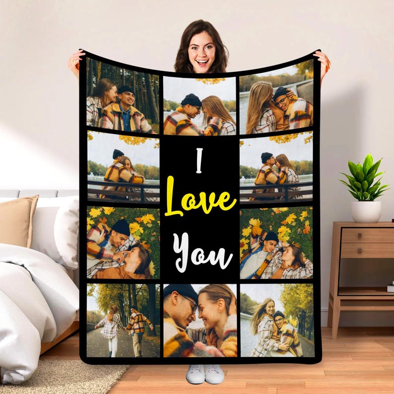 May include: A rectangular fleece blanket featuring a collage of nine photographs showing a couple in various outdoor settings, with the text "I Love You" printed in large yellow and white letters in the center of the black background.