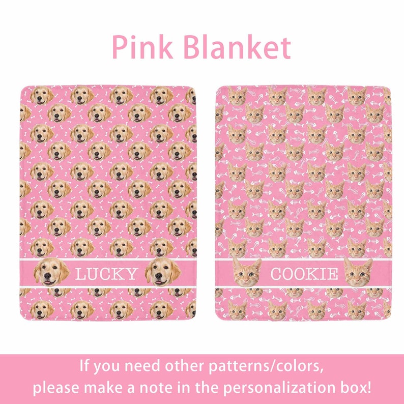 May include: Two pink blankets with pet-themed designs. One features a pattern of golden retriever faces and bone shapes, with the name "LUCKY" on a white stripe. The other blanket has a pattern of cat faces and fish bones, with the name "COOKIE".