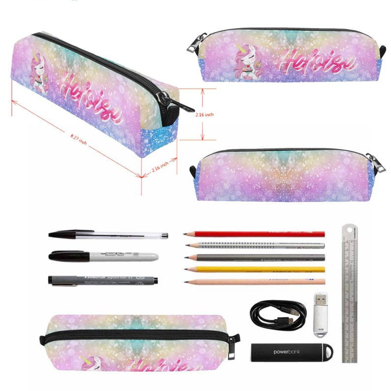 May include: A pencil case with a pastel rainbow bokeh background, a unicorn illustration, and the name Heloise in script. It measures 8.27 inches long, 2.16 inches high, and 2.16 inches wide. Includes pens, pencils, a cable, and a power bank.