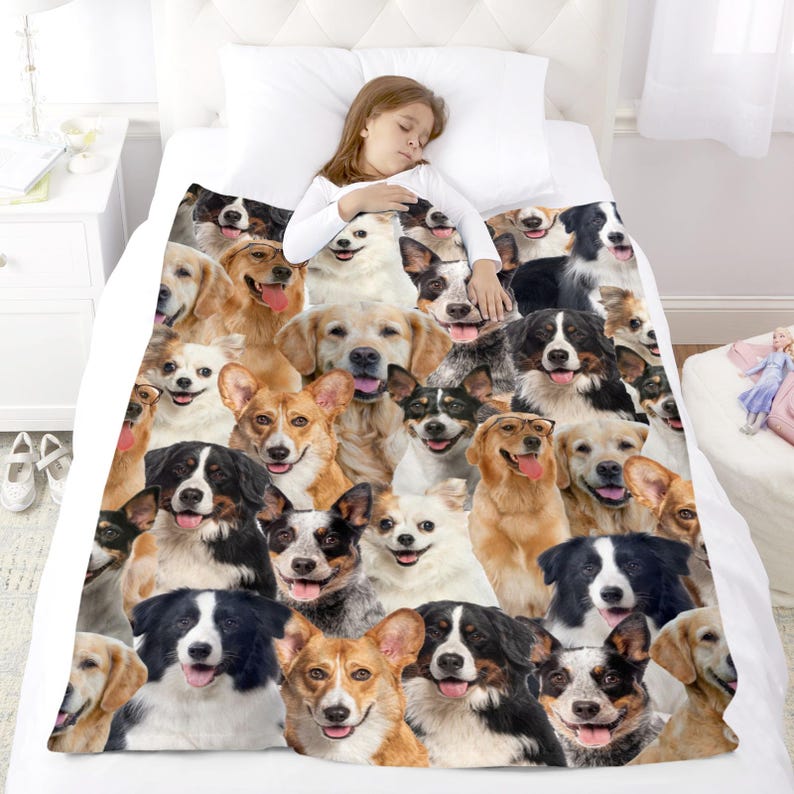 May include: A white fleece blanket with a colorful pattern of various dog breeds. The blanket features a variety of dog breeds, including Golden Retrievers, Corgis, Australian Shepherds, and more. The blanket is perfect for cuddling up on the couch or adding a touch of whimsy to any room.