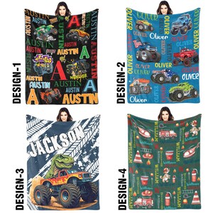 May include: Four fleece blankets with different designs. Design 1 is black with the name "Austin" and monster truck graphics. Design 2 is blue with the name "Oliver" and monster truck graphics. Design 3 is blue with the name "Jackson" and a dinosaur monster truck. Design 4 is green with the name "William" and fire truck graphics.