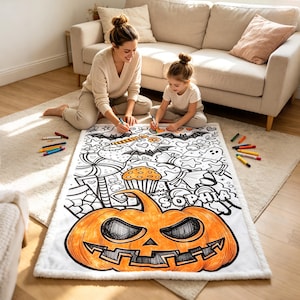 May include: A rectangular white fleece blanket featuring a large, hand-drawn style coloring design with a prominent orange jack-o'-lantern, various Halloween-themed icons like bats and candy, and the name Sophia printed in bold block letters.