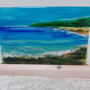 Fused glass Large Croyde Bay scene in wooden stand.