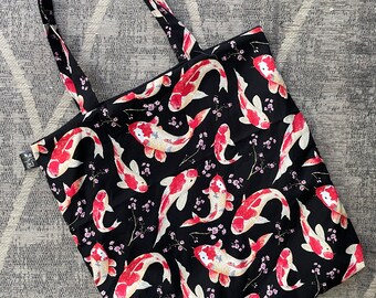 Black Koi Fish tote bag