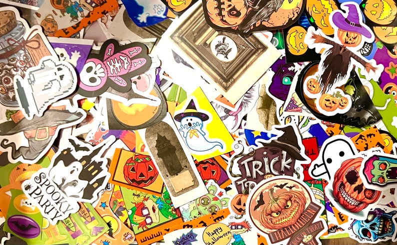 May include: A collection of Halloween themed stickers featuring ghosts, pumpkins, bats, witches, and other spooky characters. The stickers are colorful and have a variety of designs.