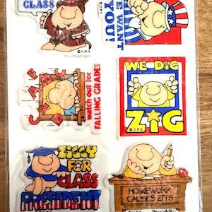 May include: Sheet of vinyl stickers featuring cartoon characters with various phrases. Stickers include "I've Got Class", "We Want You!", "We Dig Zig", "Ziggy for Class President", and "Homework Causes Zits".