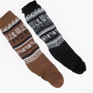 May include: Two pairs of patterned socks, one brown and white with a llama design, and one black and white with a geometric design.