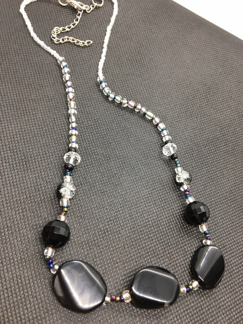 Black clear and neo crome beaded necklace