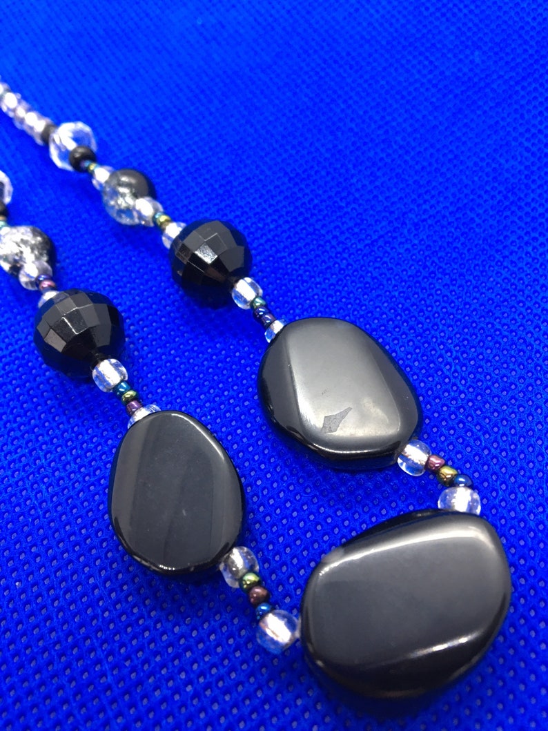 Black clear and neo crome beaded necklace