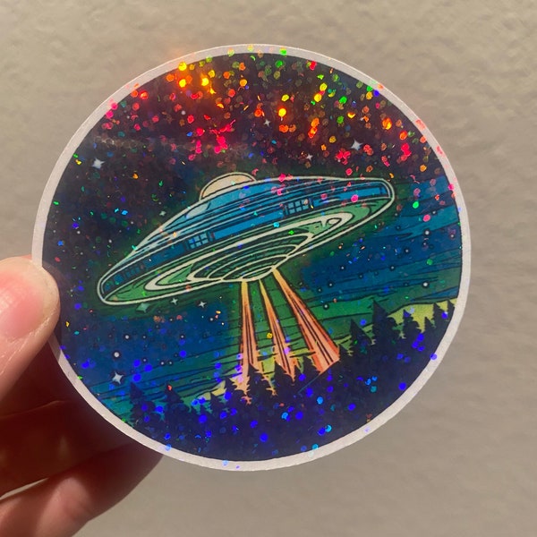UFO Holographic Vinyl Sticker - Extraterrestrial Alien Spaceship Decal with Dazzling Holographic Effect for Sci-Fi & Alien Enthusiasts