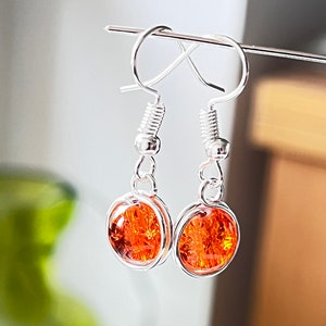 Orange earrings. Glass earrings .Orange and silver plated earrings. Mother’s Day gifts.Orange drop earrings. Dangly earrings. Summer jewelle