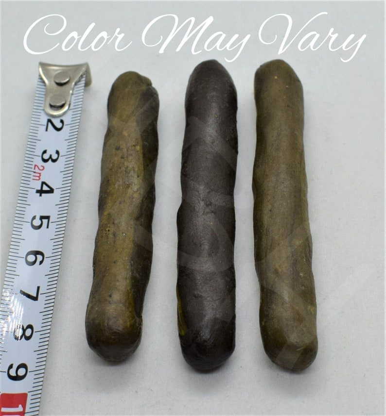 May include: Three brown and black twisted sticks, each about 4 inches long, are lined up next to a measuring tape. The text "Color May Vary" is visible at the top of the image.