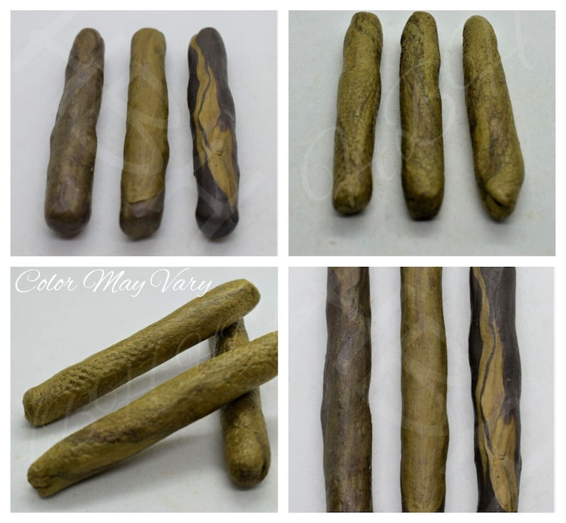 May include: Three brown and black striped sticks with a rough texture.  Color May Vary.