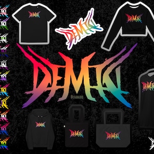 May include: A rainbow gradient graphic design of the word "DEMI" with a black background. The design is available on various products including t-shirts, hoodies, tote bags, and stickers.