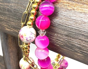 Handmade Pink Agate triple strand bracelet with painted floral beads - Gold-Plated Butterfly charm.