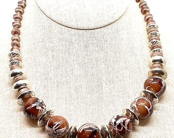 Handcrafted Brown Swirl Glass Bead Necklace with Silver Plated Accents.