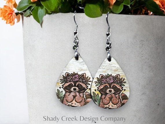 Hand Painted Wood Earrings of a Raccoon Wearing a Floral Crown, Handcrafted Wood Dangle Earrings, Raccoon Drop Earrings, Animal Earrings