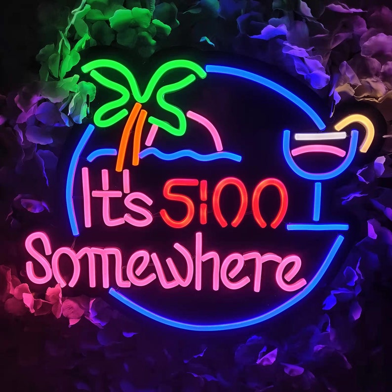 May include: Neon sign with a blue, pink and orange colour scheme. It says "It's 5:00 Somewhere" with a palm tree and a cocktail glass graphic.